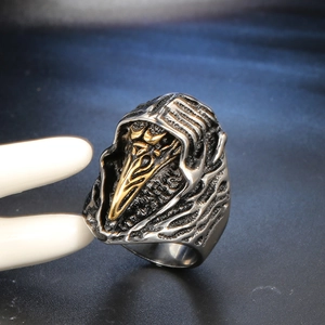Retro plague doctor skull ring for men with vintage black and gold steel finish