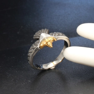 Retro hip hop eagle ring in stainless steel with two-tone silver and gold eagle wings