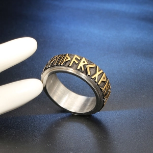 Close-up of Nordic Viking rune spinner ring made of durable stainless steel for men