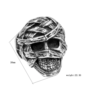 Detailed view of skull ring with mummy bandage texture showing 26mm height and 22.3g weight