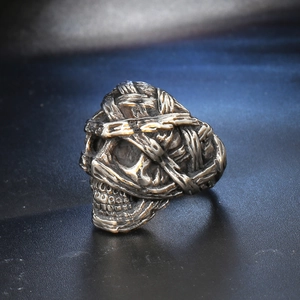 Vintage stainless steel skull ring with a punk mummy bandage design and retro silver finish