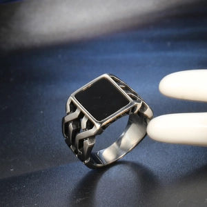Men's punk style stainless steel ring with square black inlay and hollow geometric sides