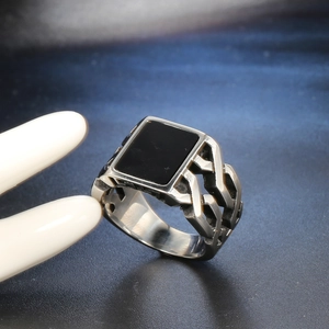Punk style men's stainless steel ring with square black gemstone and hollow side pattern
