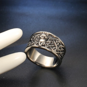 Vintage men's stainless steel skull ring with intricate Celtic knot patterns and antique finish