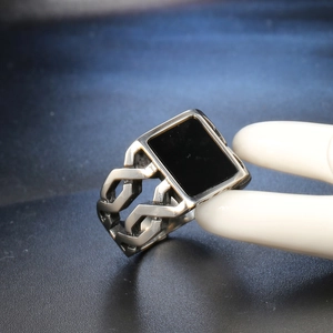 Punk style stainless steel ring with black enamel square face and geometric hollow band