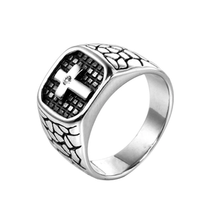 Men's vintage stainless steel signet ring featuring a cross with diamond accent