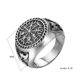 Detail showing the Viking compass totem and double axe relief on a retro steel ring