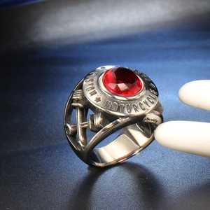 Retro stainless steel biker ring with red gemstone and custom motorcycle piston relief