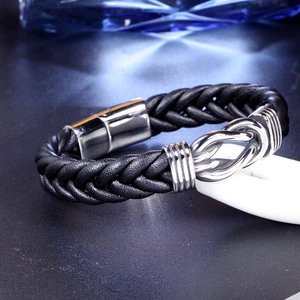 Men's braided black leather bracelet with silver magnetic clasp and knot metal charm