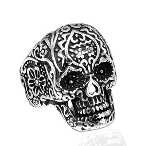 Retro silver punk skull ring with detailed floral engravings and oxidized finish