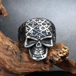 Gothic skull ring with fleur-de-lis pattern in vintage stainless steel finish