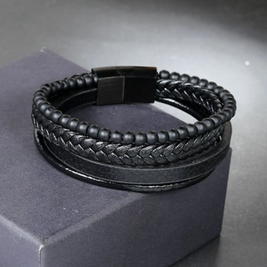 Men's multilayer black leather bracelet with steel magnetic clasp on display box