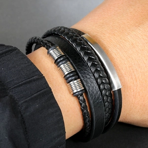 Men's multilayer black braided leather bracelet featuring a curved metal plate