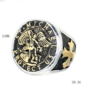 Macro shot of St. Michael relief ring in silver and gold with 24mm diameter size details