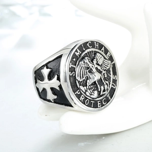 Vintage St. Michael stainless steel signet ring with religious relief and cross detail