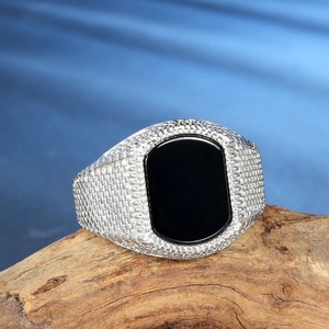 Men's vintage stainless steel ring with rectangular black gemstone and textured band