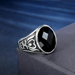 Vintage titanium steel ring for men featuring an oval black agate with intricate engravings