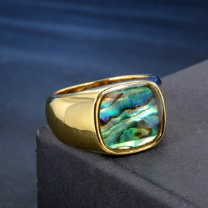 Vintage gold signet ring for men featuring an iridescent square abalone shell inlay