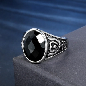 Retro titanium steel signet ring with oval black onyx and ornate vintage patterns