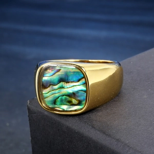 Gold-plated signet ring featuring a rectangular abalone shell inlay on a dark base