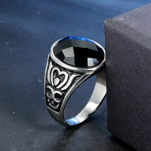 Vintage titanium steel ring for men featuring a black agate stone and tribal heart relief