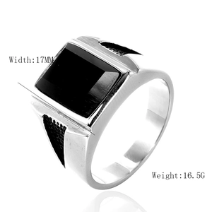 Men's gothic punk stainless steel ring featuring a square black agate stone on white background