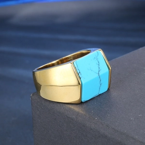 Macro shot of men's square gold stainless steel ring with rectangle turquoise inlay
