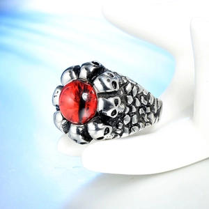 Punk gothic skull ring in vintage stainless steel with a bold red cat-eye gemstone