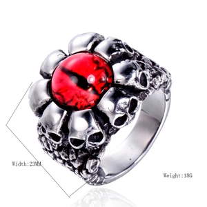 Punk style stainless steel skull ring for men with center red stone and 23mm band width