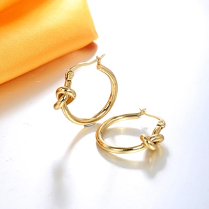 Boucles d'oreilles créoles nouées en acier inoxydable plaqué or 18k avec fini poli miroir