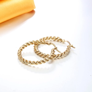 Elegant gold twisted hoop earrings for women with minimalist braided metal design