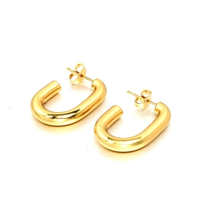 Boucles d'oreilles en U en acier titane doré 18 carats au style minimaliste