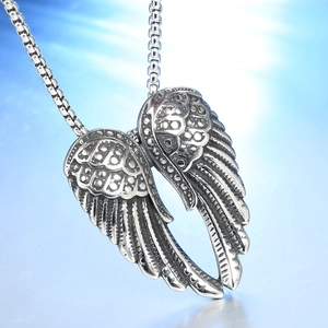 Vintage stainless steel angel wings pendant necklace with detailed feather texture