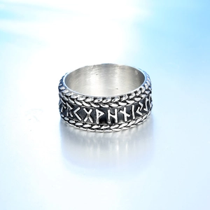 Vintage silver stainless steel Viking rune ring with embossed bear claw textured edges