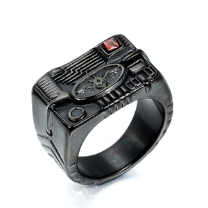 Gothic industrial gun black ring with red zircon and winged skull relief details