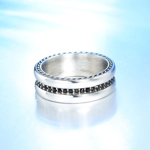 Silver steel ring with black cubic zirconia inlay and vintage beaded edge design