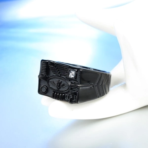 Macro view of black punk ring featuring circuit patterns and square zircon inlay