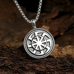 Vintage Slavic Kolovrat sun wheel pendant necklace with rustic silver finish and wheat chain
