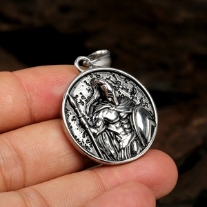 Vintage stainless steel round necklace featuring an embossed Spartan warrior pendant
