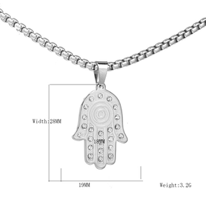 Hamsa Hand necklace for men in silver stainless steel with white rhinestones on white background