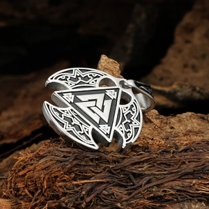 Nordic Viking Valknut pendant necklace in vintage silver stainless steel on bark background