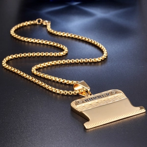 Collier avec pendentif tondeuse de barbier doré poli et chaîne à mailles carrées homme