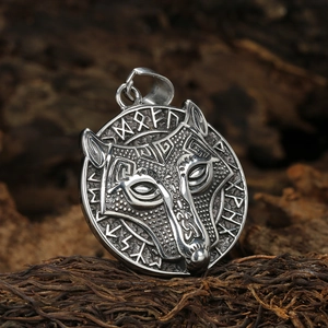 Vintage stainless steel wolf head pendant necklace with Nordic runes on wooden background