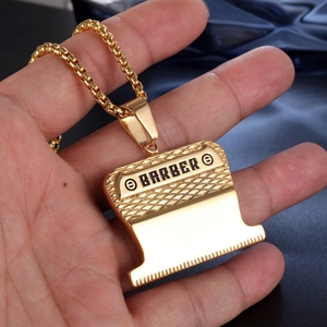 Gold stainless steel barber hair clipper pendant necklace with bead chain on hand