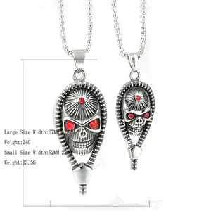 Pendentifs crâne vintage en acier inoxydable avec yeux en cristal rouge en deux tailles