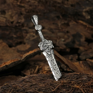 Vintage stainless steel sword pendant necklace with gothic rune carvings on rustic wood