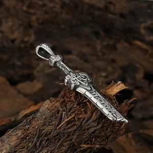 Vintage stainless steel sword pendant necklace with engraved runes on rustic bark background