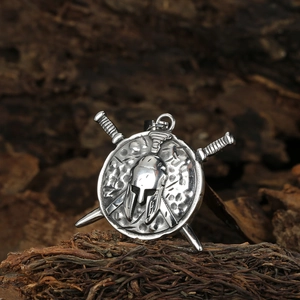 Vintage stainless steel Spartan helmet pendant with shield and cross swords on wood