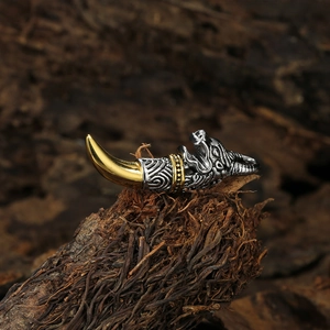 Vintage stainless steel wolf fang pendant necklace with silver and gold textured finish