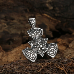 Vintage Celtic knot pendant in retro black stainless steel finish on wood background